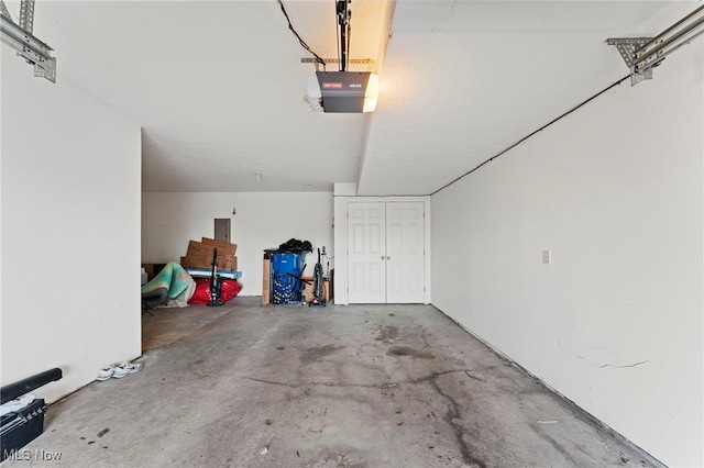 garage featuring a garage door opener