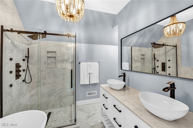 full bathroom with marble finish floor, a sink, and a notable chandelier