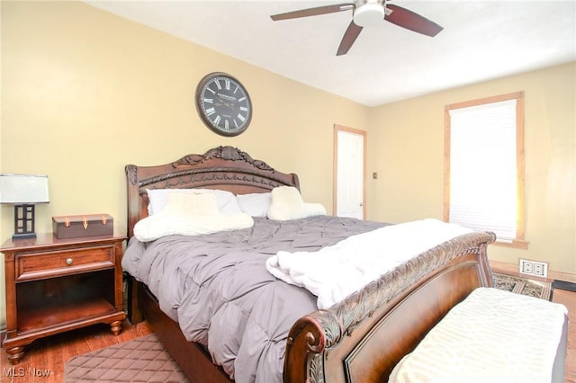 bedroom featuring ceiling fan and wood finished floors