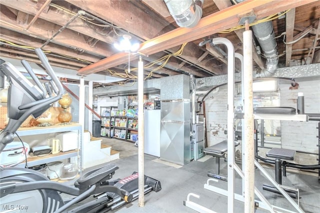 interior space with heating unit and stairs