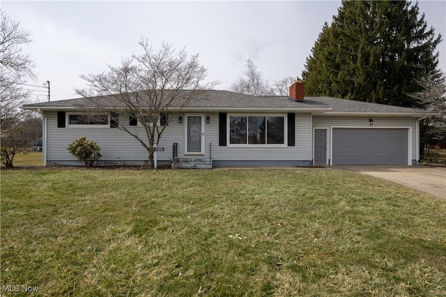 ranch-style house with a front yard, driveway, a chimney, and an attached garage