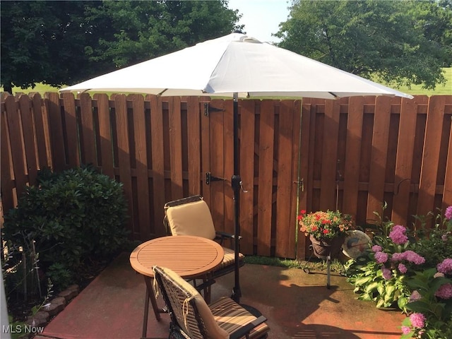 view of patio / terrace with fence