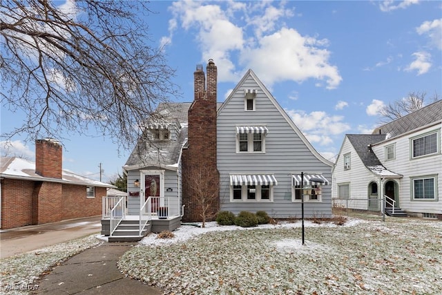 view of front of property with a chimney