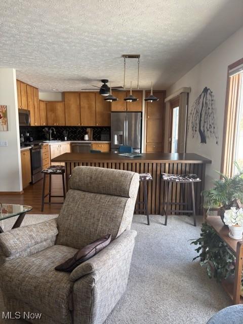 living room with a textured ceiling