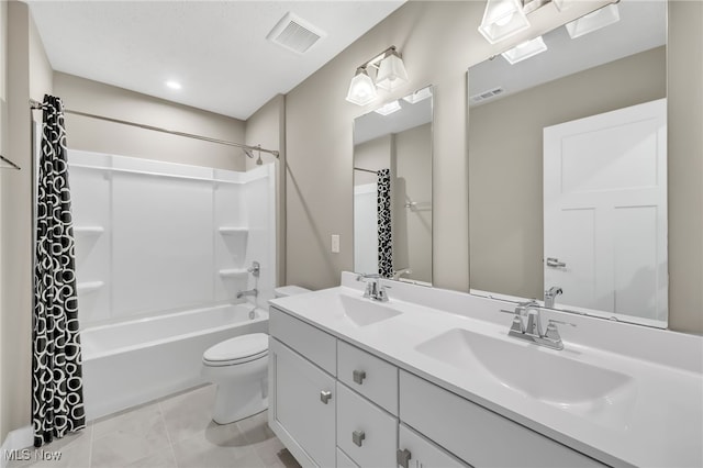 full bathroom with toilet, a sink, and visible vents