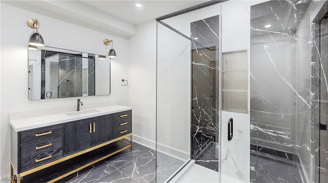 bathroom featuring recessed lighting, marble finish floor, vanity, and a marble finish shower