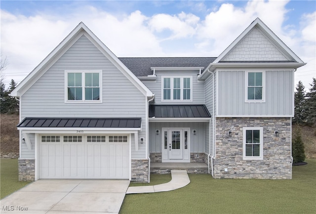 craftsman house featuring a standing seam roof, stone siding, and a front lawn