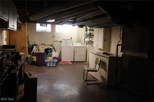 basement featuring washer and dryer