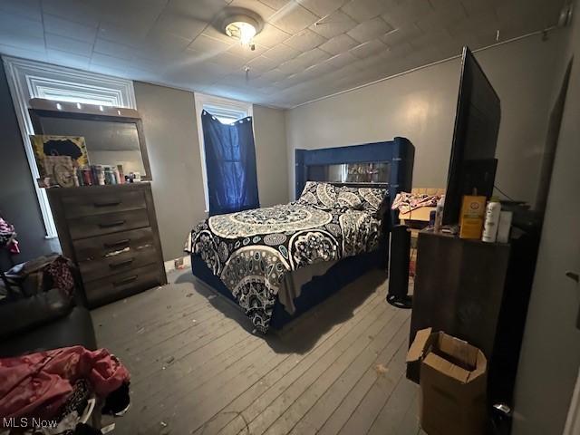 bedroom featuring hardwood / wood-style floors