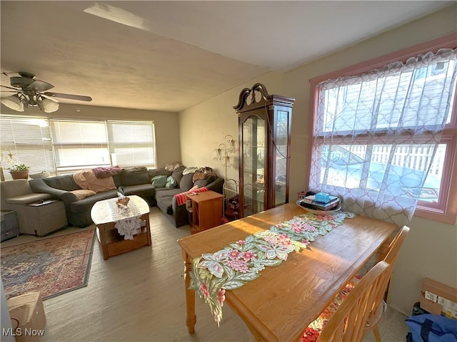 dining space featuring a ceiling fan