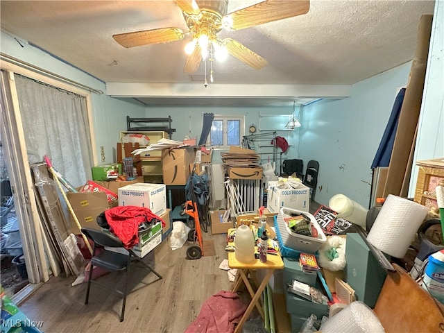 interior space featuring ceiling fan