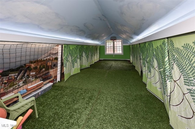 bonus room featuring lofted ceiling and carpet