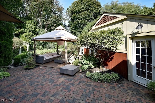 view of patio / terrace featuring an outdoor hangout area and a gazebo