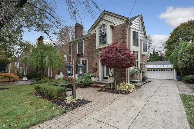 view of front of house with brick siding and a front yard