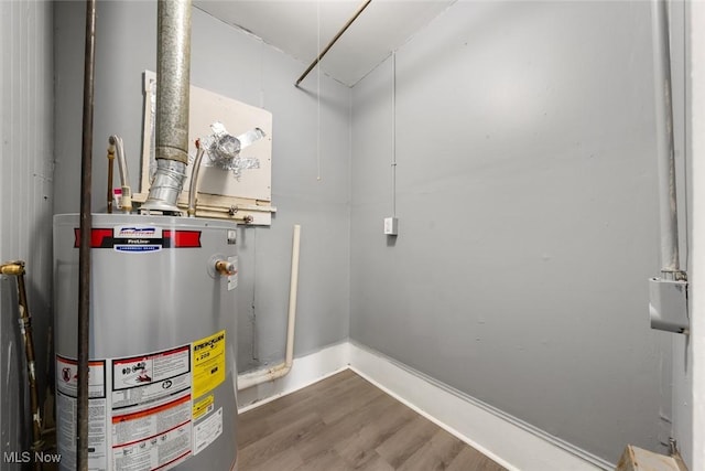 utility room with water heater