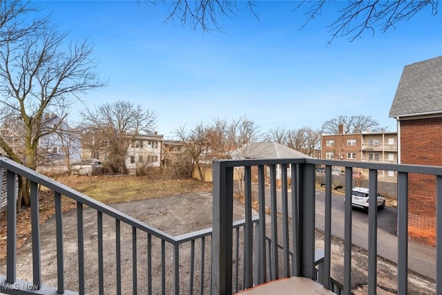 balcony featuring a residential view