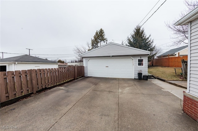 detached garage with fence