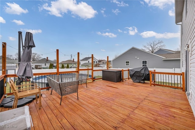 wooden terrace with grilling area