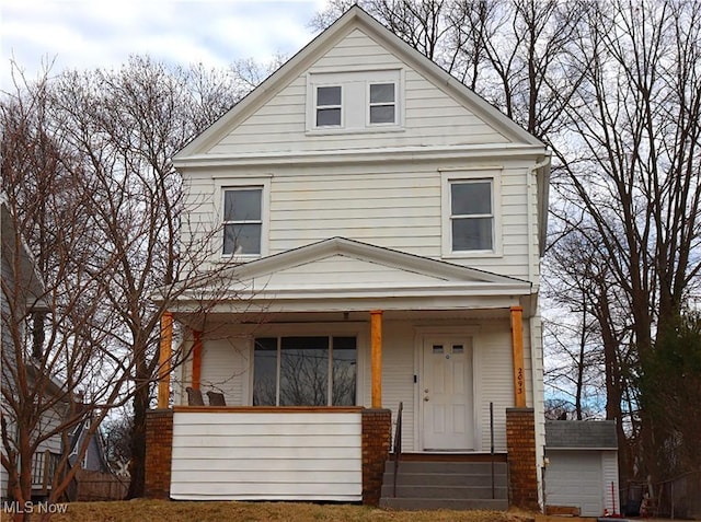 traditional style home featuring a porch