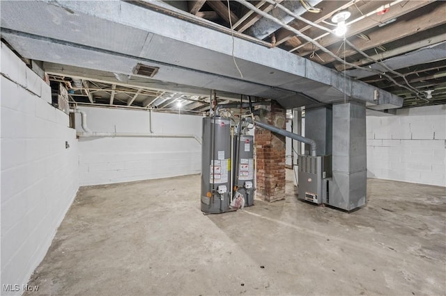 unfinished basement featuring water heater and heating unit