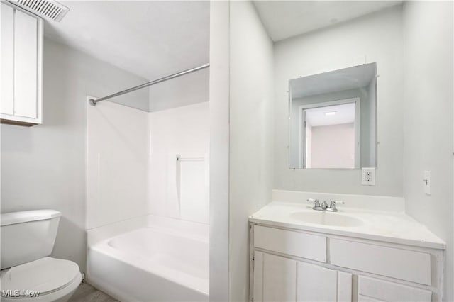 full bathroom with toilet, bathing tub / shower combination, vanity, and visible vents