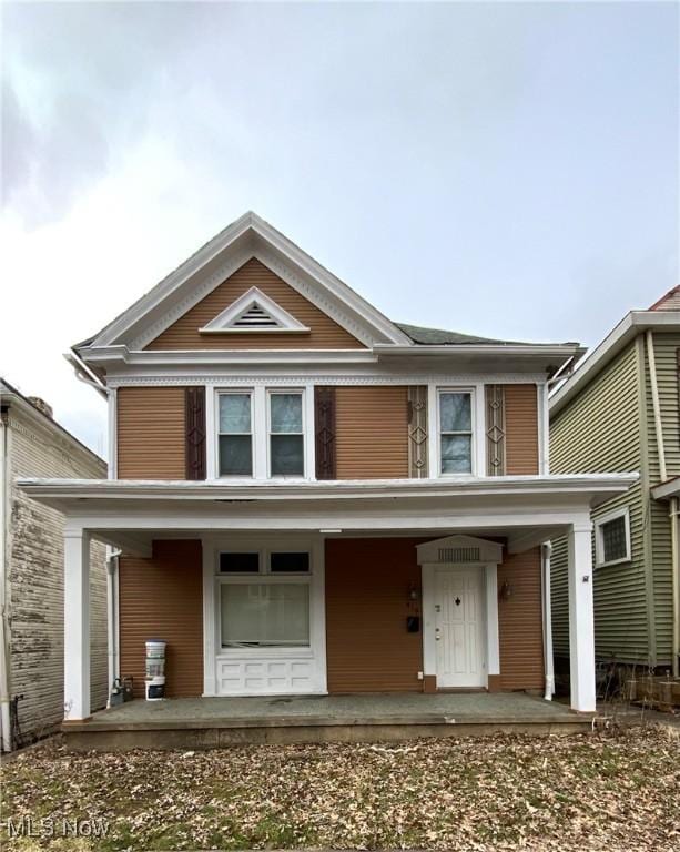 view of front of home featuring covered porch