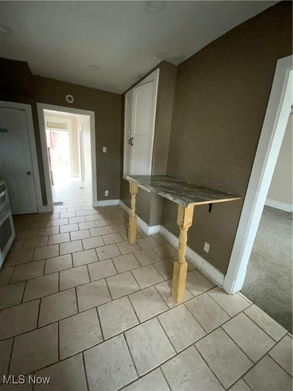 419 Vine St, East Liverpool, OH 43920 - interior space featuring baseboards and light tile patterned floors