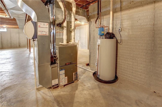 utility room featuring gas water heater and heating unit