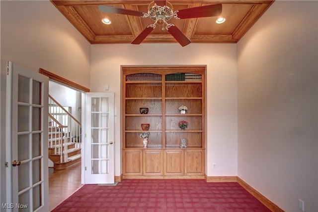 interior space with wooden ceiling, recessed lighting, a ceiling fan, baseboards, and crown molding