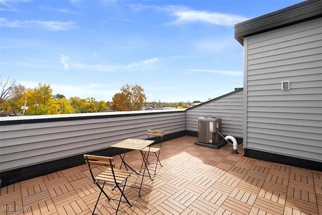 view of patio with central AC