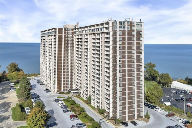 view of building exterior with a water view