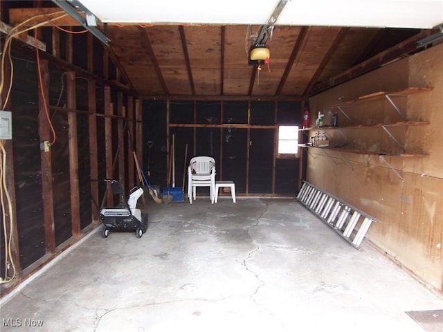 garage featuring a garage door opener