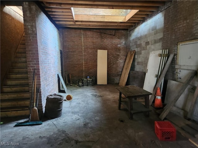 basement featuring stairs