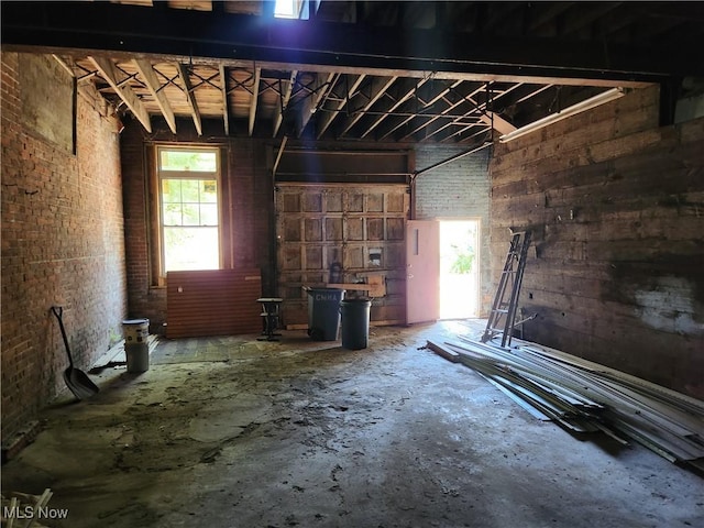 miscellaneous room with brick wall