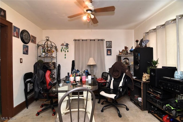 office featuring carpet floors and ceiling fan