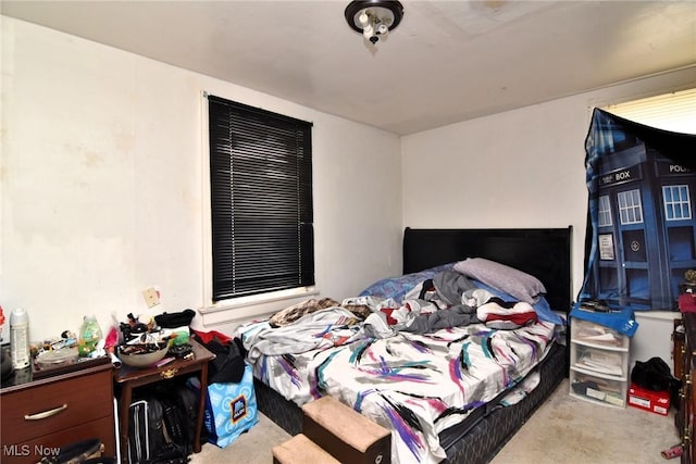 bedroom featuring carpet flooring