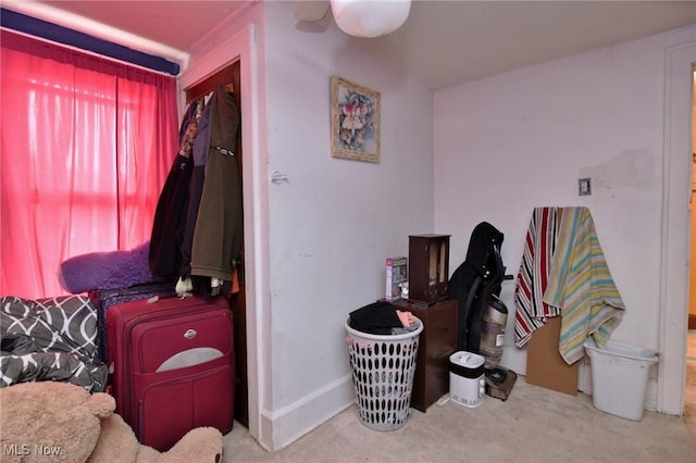 carpeted bedroom with baseboards