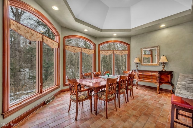 dining space featuring recessed lighting, visible vents, baseboards, and plenty of natural light