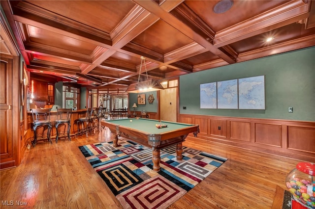 recreation room with beamed ceiling, pool table, a bar, and coffered ceiling