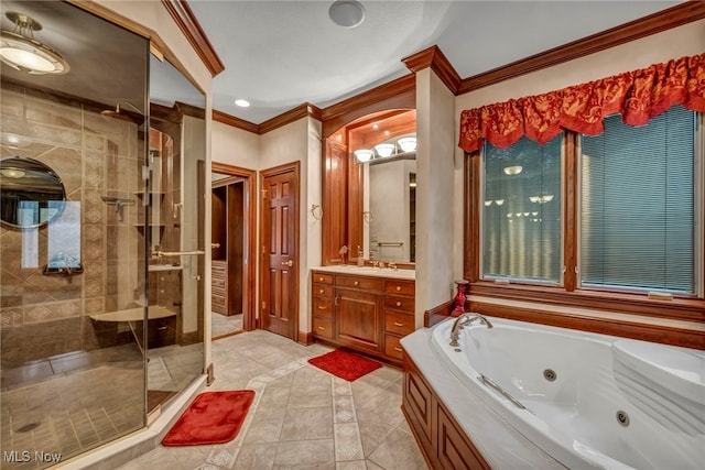 bathroom with tile patterned floors, a stall shower, a whirlpool tub, crown molding, and vanity