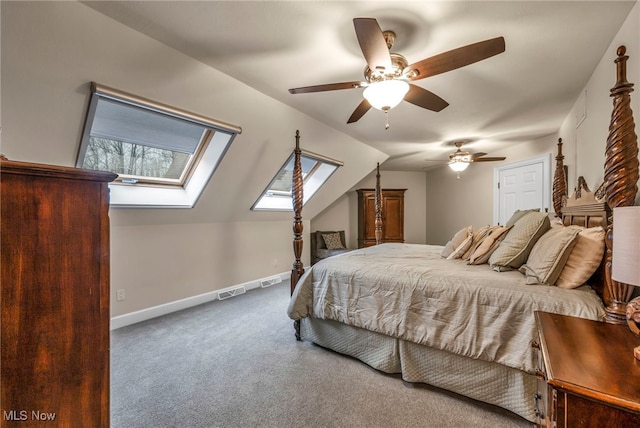 carpeted bedroom with lofted ceiling with skylight, visible vents, ceiling fan, and baseboards