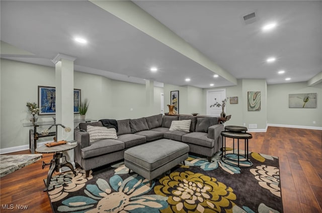 living area featuring recessed lighting, visible vents, baseboards, and dark wood finished floors