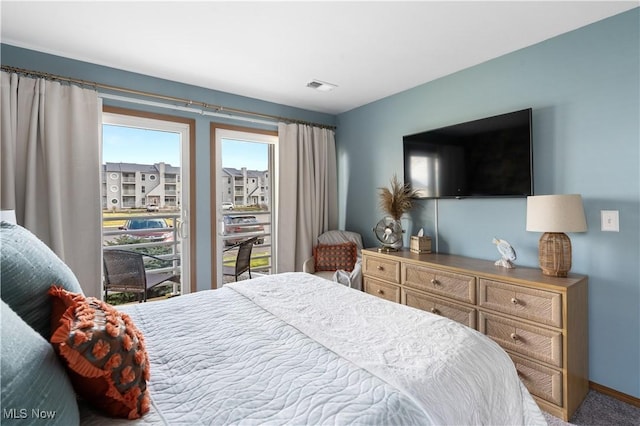 bedroom with visible vents