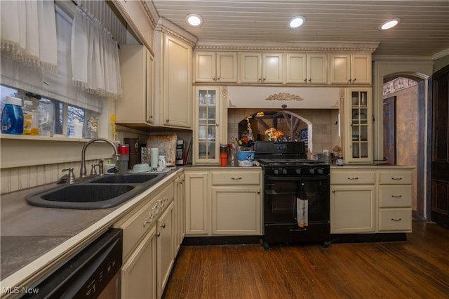 kitchen with cream cabinetry, a sink, black gas range oven, and dishwasher