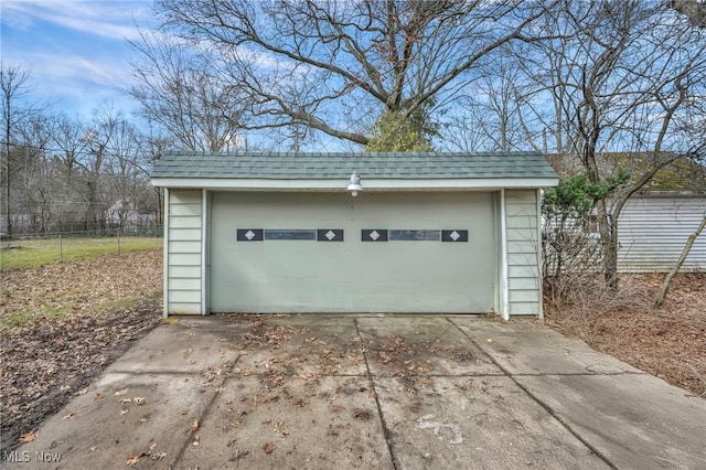 garage featuring fence