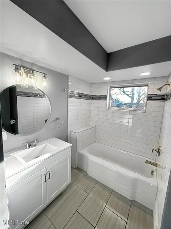 full bath featuring shower / bathtub combination and vanity