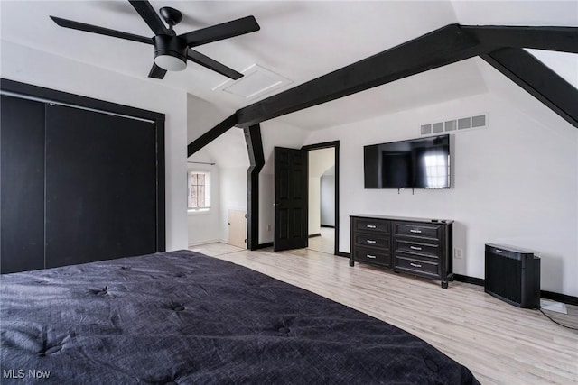 4649 State Route 305, Southington, OH 44470 - bedroom with lofted ceiling with beams, visible vents, baseboards, a ceiling fan, and light wood finished floors