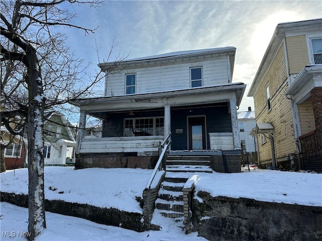 view of front of property featuring covered porch