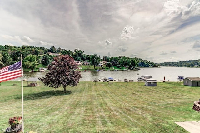 view of yard with a water view