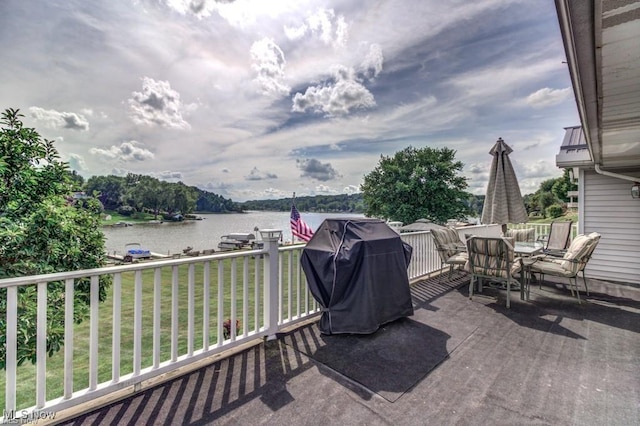 382 E Mohawk Dr, Malvern, OH 44644 - view of patio / terrace featuring a water view, a grill, and outdoor dining space
